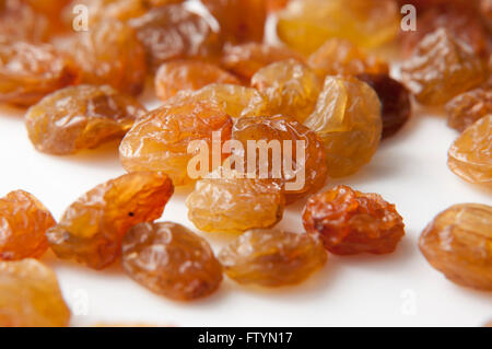 raisins on the white background close up Stock Photo