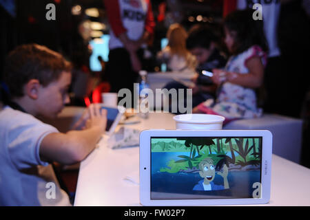 Buenos Aires, Argentina. 30th Mar, 2016. Children attend the launching cermeony of the YouTube Kids application in Buenos Aires, Argentina, on March 30, 2016. © Osvaldo Fanton/TELAM/Xinhua/Alamy Live News Stock Photo