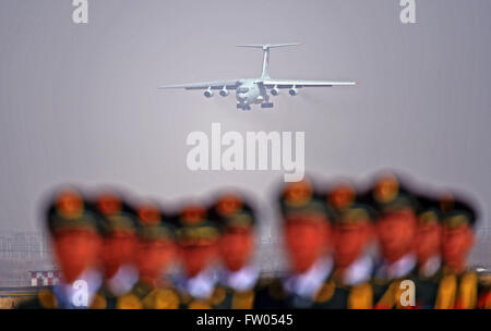 Shenyang, China. 31st March, 2016. A transportation plane carrying coffins containing remains of soldiers of the Chinese People's Volunteers (CPV) killed in the Korean War, lands at the Taoxian International Airport in Shenyang, northeast China's Liaoning Province, March 31, 2016. The remains of 36 Chinese soldiers killed in the 1950-53 Korean War were returned to China on Thursday from the Republic of Korea (ROK), the third batch returned following a handover agreement signed by the two countries in 2013. Credit:  Xinhua/Alamy Live News Stock Photo