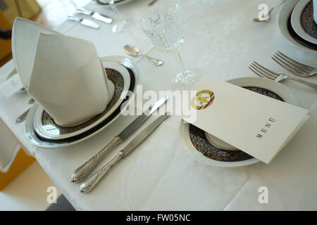Berlin, Germany. 31st Mar, 2016. A view of a table setting from a state banquet reproduction in the exhibition 'Palaces for the State Visitor. State visits in the divided Germany' in Schoenhausen Palace in Berlin, Germany, 31 March 2016. From 01 April until 03 July 2016, The Prussian Palaces and Gardens Foundation Berlin-Brandenburg is showing the exhibition in Schoenhausen Palace. The Schoenhausen Palace was the guest house of the German Democratic Republic between 1966 and 1990. Photo: JOERG CARSTENSEN/dpa/Alamy Live News Stock Photo