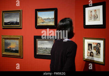 Berlin, Germany. 31st Mar, 2016. A woman looks at paintings during a preview of the exhibition 'The Copenhagen School of Painting' in the Alte Nationalgalerie museum in Berlin, Germany, 31 March 2016. The pictures and studies from the Nationalgalerlie and the Christoph Mueller Collection can be seen from 01 April until 31 July 2016. Photo: JENS KALAENE/dpa/Alamy Live News Stock Photo