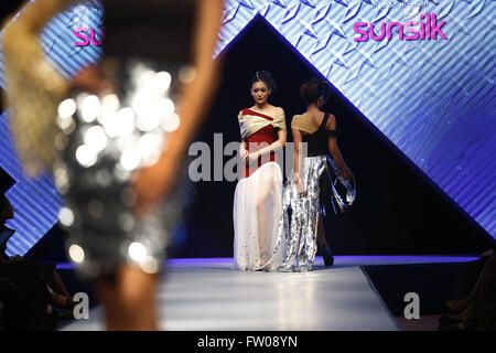 Kathmandu, Nepal. 31st Mar, 2016. Nepalese models catwalk on the runway on the second day of Nepal fashion week also known as The Himalayan Times TGIF Nepal Fashion Week at Hyatt Regency in Kathmandu, Nepal on Thursday, March 31, 2016. Celebrities and fashion models from around the world come to represent for the designers to promote their designs. The event is the top most fashion week of the country held annually by The Himalayan Times, a leading and largest selling English daily newspaper in Nepal. The fashion week lasts for 4 days with glitz and glamor on the catwalk. (Credit Image: © Sk Stock Photo