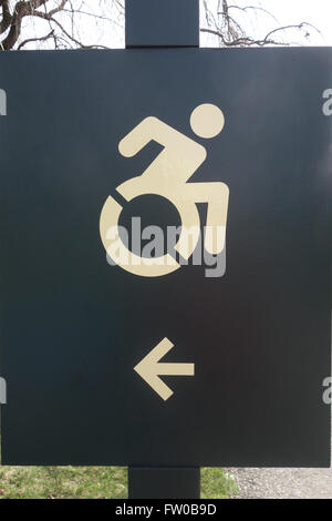 Handicap Sign with Arrow Stock Photo - Alamy