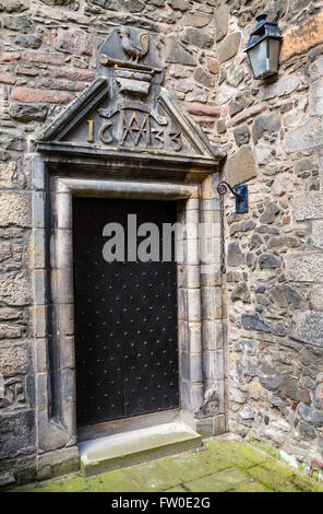 An entrance to Acheson House in the historic city of Edinburgh, Scotland.  The house was built in 1633 (as the marking above the Stock Photo