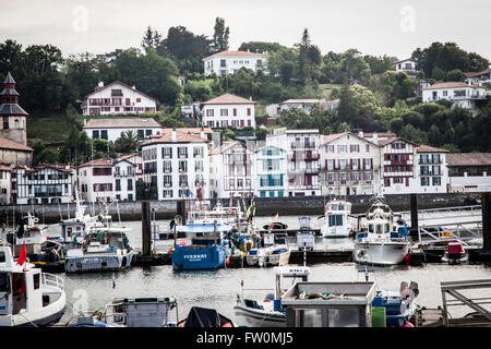 Fishing boats moored in the harbor of Saint Jean de Luz, in the Pays Basque, France. Stock Photo
