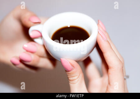 Taking the neapolitan coffee in ceramic cup Stock Photo