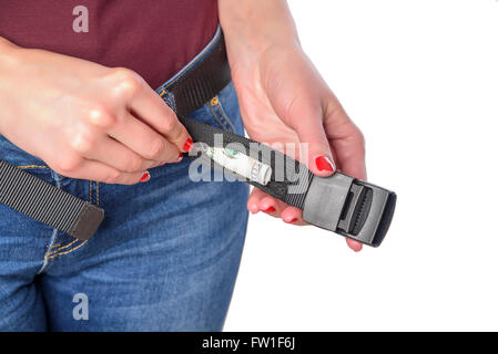 Money in a secret pocket of the belt. Isolated on white. Stock Photo