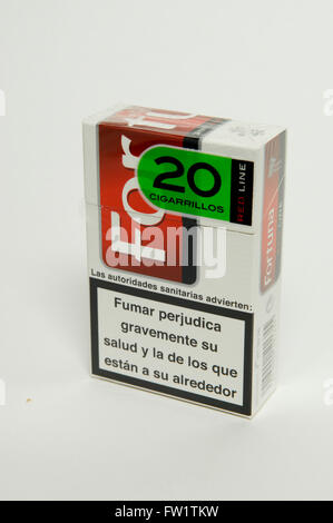 Packet of Fortuna Cigarettes Tobacco on white background Stock Photo