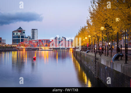 Red iron bridge at Salford Quays, Manchester, England. Stock Photo