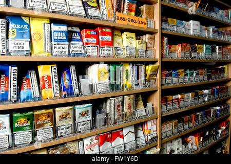 Selection of Hand Rolling Tobacco on sale in a tobacconist. Stock Photo