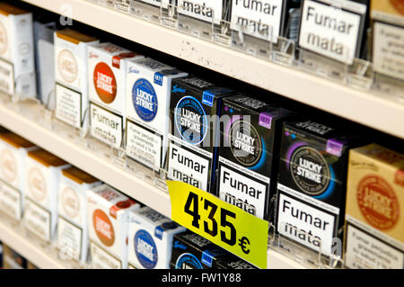Selection of Lucky Strike Cigarettes on sale in a tobacconist. Stock Photo
