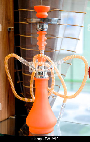 Shisha pipe-Hookah,Pneumatic Water Pipe is a single or multi-stemmed instrument for vaporizing and smoking flavored tobacco Stock Photo