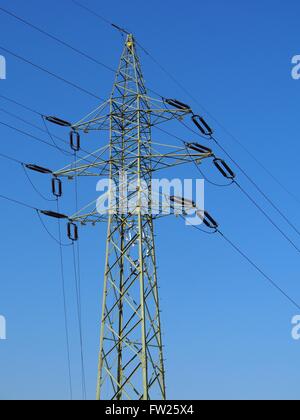 High voltage tower against blue sky. Low angle view Stock Photo - Alamy