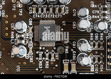 Close up of integrated circuit on printed circuit board  assembly,  Electronic components computer component electronics Stock Photo