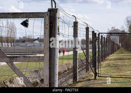 Fence around Dachau concentration camp Stock Photo