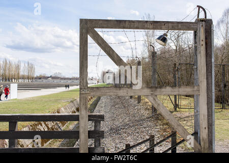 Fence around Dachau concentration camp Stock Photo