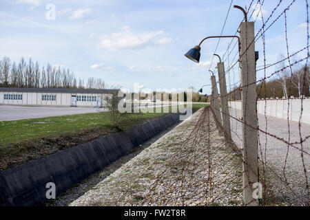Fence and wall around Dachau concentration camp Stock Photo