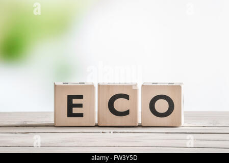 Eco word sign on wooden cubes on a table Stock Photo