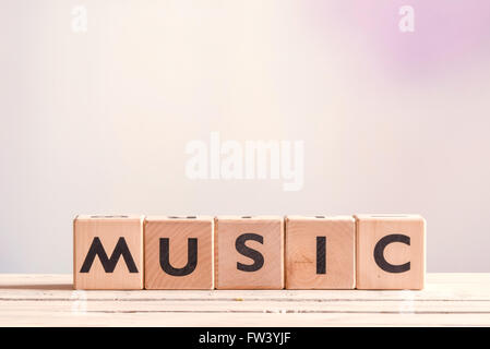 Music sign created with cubes on a wooden table Stock Photo