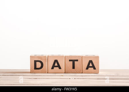 Data sign on a white background on a desk Stock Photo