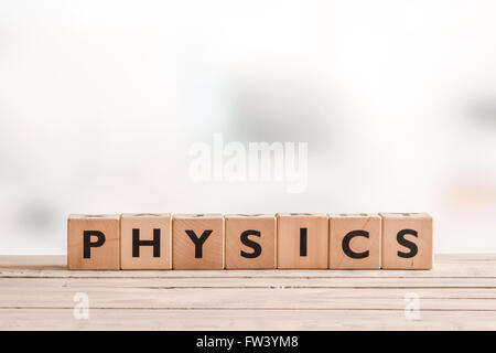 Physics sign made of solid cubes on a desk Stock Photo