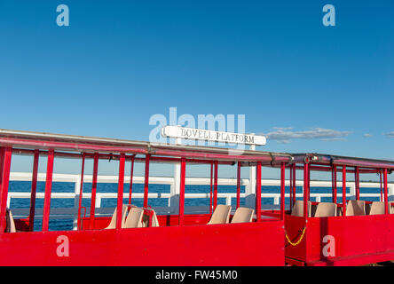 The small red train travels along the longest jetty of the Southern hemisphere, Busselton, Western Australia Stock Photo