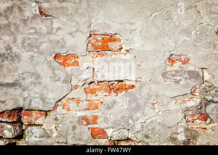 Image of cracked bricked wall. Abstract background masonry concept. Stock Photo