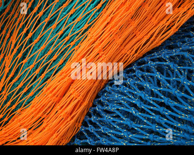 A colourful new nylon fishing (trawl) net. Stock Photo