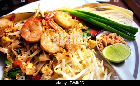 Pad Thai, stir-fried rice noodles with shrimps, Thailand's national dishes. Stock Photo