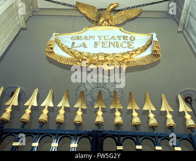 Teatro La Fenice - sign outside the opera house in Venice, Italy with a golden phoenix on top. First opened 16 May 1792, Stock Photo