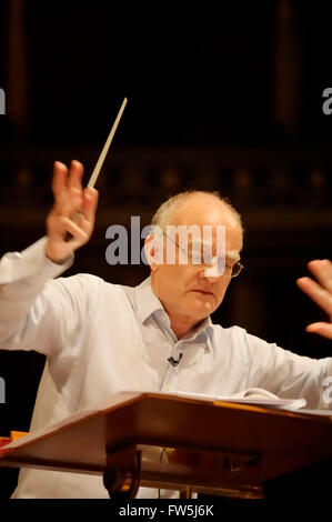 John Rutter, composer and editor, conducting his Requiem in the Royal Albert Hall with the Really Big Chorus, for Concerts from Scratch. Stock Photo