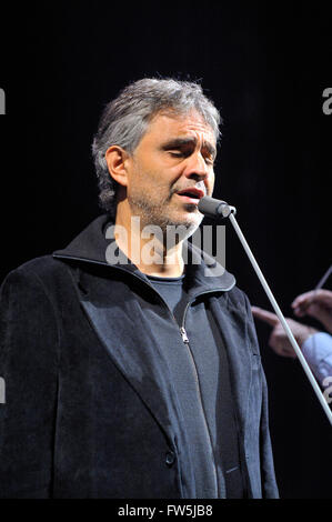 Andrea Bocelli, blind Italian tenor, soloist, celebrity, recording superstar, rehearsing with orchestra and microphone in the O2 Arena, Millennium Dome, North Greenwich, London. Born 22 September 1958, on family farm at Lajatico near Pisa, Italy Stock Photo