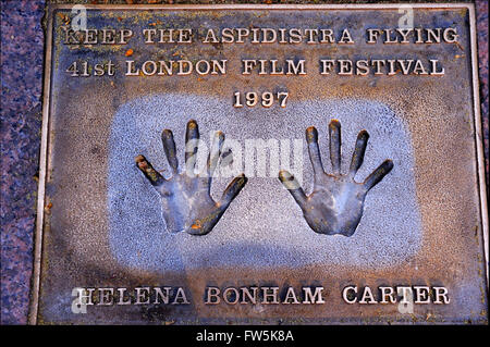 Helena Bonham Carter bronze plaque of handprint set into the pavement of Leicester Square: of Helena Bonham Carter: 'Keep the Stock Photo