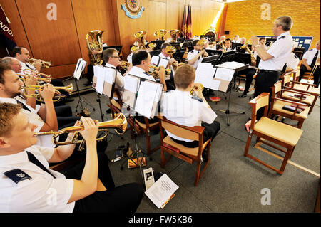 Salvation Army Band playing before a service. Hendon, London NW4. In summer shirt-sleeves uniform. Continuing the high standards of British brass band playing. Stock Photo