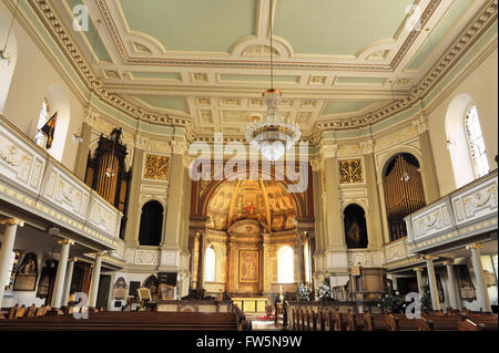 interior of Marylebone Parish Church, Marylebone Rd., London NW1.; designed by Thomas Hardwicke and consecrated in 1817 , amended 1884 by Thomas Harris, architect, in the neo-classical style combined with the pre-Raphaelite love of detail. English poet Robert Browning was married here to Elizabeth Barrett on 12 Sept. 1846, and novelist Charles DIckens (1812-1870) lived close by at Devonshire Terrace. His son was baptised in this church. The ceremony is described by Dickens in his novel 'Dombey and Son'. Many of the characters in David Copperfield are based on well-known persons then living in Stock Photo