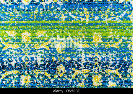 Detail of colored weft of a woolen carpet. Stock Photo