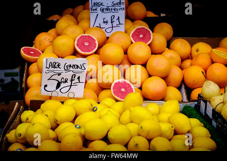 Lemons and grapefruit for sale on a stall in the Bullring Street Market in Birmingham, England, UK Stock Photo