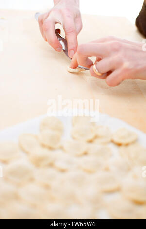 Knead orecchiette homemade Stock Photo