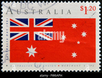 AUSTRALIA - CIRCA 1991: A stamp printed in Australia shows australian red ensign, merchant ships, circa 1991 Stock Photo
