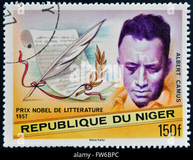 NIGER - CIRCA 1977: A stamp printed in Niger shows Nobel Prize in Literature, Albert Camus, circa 1977 Stock Photo