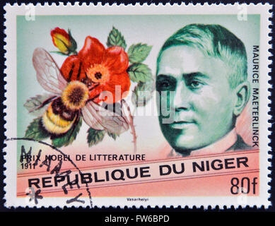 NIGER - CIRCA 1977: A stamp printed in Niger shows Nobel Prize in Literature, Maurice Maeterlinck, circa 1977 Stock Photo