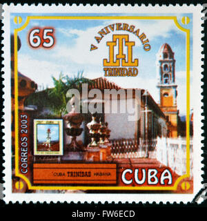 CUBA - CIRCA 2003: A stamp printed in Cuba dedicated to the Cuban cigar industry shows Trinidad, circa 2003 Stock Photo