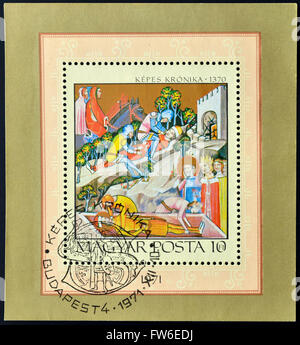 HUNGARY - CIRCA 1971: A stamp printed in Hungary shows Bazarad's Victory over King Karoly I Stock Photo
