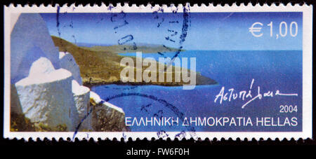 GREECE - CIRCA 2004: A stamp printed in Greece shows a panorama from Astypalaia island, circa 2004. Stock Photo