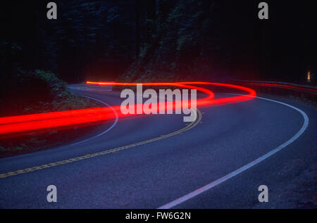 Streaking Car Tail Lights on a Road, California, U.S.A. Stock Photo