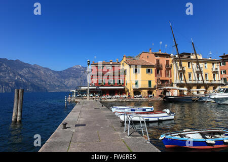 View of Malcesine town center and small port. Malcesine is located on the eastern shore of Lake Garda in the Province of Verona Stock Photo