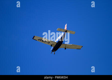 Tayside Aviation Piper PA-28-161 Cherokee Warrior II 'G-OWAP' aircraft flying overhead at the airport in Dundee, UK