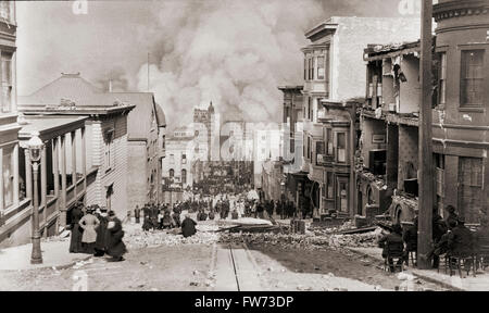 Ruins in San Francisco, California, United States of America, after the earthquake of April 18, 1906.  The picture shows Sacramento Street with people watching an approaching fire.  Fire caused more damage than the earthquake.   After an original photograph by photographer Arnold Genthe, 1869-1942. Stock Photo