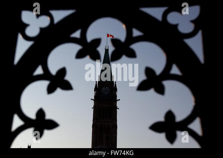 The Peace tower framed up with the fence around Parliament Hill in Ottawa Ont., on Sunday Jul. 26, 2015. Stock Photo