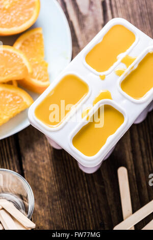 Making natural juice popsice at home, view from above Stock Photo